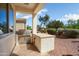 Outdoor kitchen with built-in grill and prep station is perfect for outdoor cooking and entertaining at 23123 N Cardenas Dr, Sun City West, AZ 85375