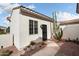 Charming courtyard with desert landscaping and a quaint entrance at 23123 N Cardenas Dr, Sun City West, AZ 85375