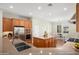 Modern kitchen with stainless steel appliances, a center island, and a breakfast nook at 23123 N Cardenas Dr, Sun City West, AZ 85375