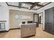 Inviting reception area featuring a textured accent wall, modern desk, and sleek design elements at 23123 N Cardenas Dr, Sun City West, AZ 85375