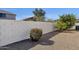 Landscaped backyard featuring desert landscaping, and a privacy fence at 2417 W Apache Rain Rd, Phoenix, AZ 85085