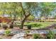 Community park with green grass, trees, a playground and picnic area, ideal for families at 2512 E Vermont Dr, Gilbert, AZ 85295