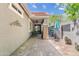 Covered patio with brick columns and ceiling fans, perfect for outdoor relaxation at 2512 E Vermont Dr, Gilbert, AZ 85295