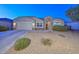 Beautiful single-story home with well-maintained landscaping and a two-car garage at 30116 W Fairmount Ave, Buckeye, AZ 85396