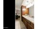 Bathroom vanity with granite countertops and ample storage at 322 W Laguna Dr, Tempe, AZ 85282