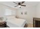 Bedroom with a ceiling fan, neutral walls, and carpet at 322 W Laguna Dr, Tempe, AZ 85282