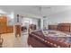 Bright main bedroom featuring mirrored closet doors and tile floors at 5165 E Tunder Dr, Phoenix, AZ 85044