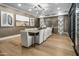 Modern dining room featuring a long table with seating for ten, stylish decor, and wood flooring at 5250 E Deer Valley Dr # 343, Phoenix, AZ 85054