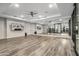 Spacious fitness center with wood floors, mirrored walls, and modern equipment in a well-lit community space at 5250 E Deer Valley Dr # 343, Phoenix, AZ 85054