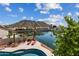 Backyard pool showcasing mountain views and poolside lounge area at 5471 W Quail Ave, Glendale, AZ 85308