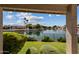 Relaxing backyard view of the water and other homes across the water at 5471 W Quail Ave, Glendale, AZ 85308