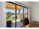 The dining area shows the backyard view of the water in the distance at 5471 W Quail Ave, Glendale, AZ 85308