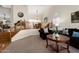 Comfortable living room with staircase and dining area in view at 5471 W Quail Ave, Glendale, AZ 85308