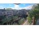 Stunning view of condos featuring lush landscaping, private patios, and ample outdoor living spaces at 7147 E Rancho Vista Dr # 7004, Scottsdale, AZ 85251