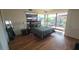 Comfortable bedroom featuring wood floors, large windows, and modern furnishings at 7147 E Rancho Vista Dr # 7004, Scottsdale, AZ 85251