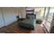 Cozy bedroom with ample natural light from the floor-to-ceiling windows and stylish decor at 7147 E Rancho Vista Dr # 7004, Scottsdale, AZ 85251