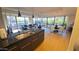 The Kitchen and Living area feature modern design, granite counters, and large windows overlooking outdoor area at 7147 E Rancho Vista Dr # 7004, Scottsdale, AZ 85251