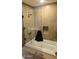 Modern glass shower and bathtub combination with stylish tile and a built-in niche at 7147 E Rancho Vista Dr # 7004, Scottsdale, AZ 85251