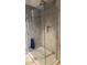 Modern glass-enclosed shower with stylish tile and a built-in niche at 7147 E Rancho Vista Dr # 7004, Scottsdale, AZ 85251