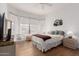 Light-filled bedroom with a ceiling fan and a large window with sheer curtains at 7195 E Canyon Wren Dr, Gold Canyon, AZ 85118