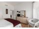 Cozy bedroom featuring a dresser and woven chair with wood-look floors at 7195 E Canyon Wren Dr, Gold Canyon, AZ 85118