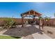 Back yard featuring gazebo with string lights, gas grill, and orange tree at 7531 W Rock Springs Dr, Peoria, AZ 85383