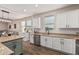 This kitchen is equipped with stainless steel appliances, granite countertops, and white subway tile backsplash at 7531 W Rock Springs Dr, Peoria, AZ 85383