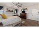 This bedroom features lots of natural light, wood-look flooring and baseboards at 7531 W Rock Springs Dr, Peoria, AZ 85383