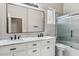 Beautiful bathroom featuring double vanity and glass enclosed shower at 7919 E Posada Ave, Mesa, AZ 85212