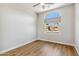 Bedroom with hardwood floors and ceiling fan at 7919 E Posada Ave, Mesa, AZ 85212