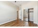 Bedroom with hardwood floors and closet at 7919 E Posada Ave, Mesa, AZ 85212