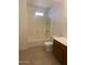 A bathroom featuring tile floors and a shower/tub combo at 813 N Trekell Rd, Casa Grande, AZ 85122