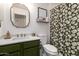 Bathroom featuring a decorative shower curtain, stylish vanity, and framed art at 9420 E Plata Ave, Mesa, AZ 85212