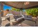 An inviting outdoor gazebo with comfortable seating and a built-in beverage center at 9420 E Plata Ave, Mesa, AZ 85212