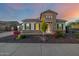 Lovely home showcasing attractive landscaping with stone accents and neutral tones at 10110 W El Cortez Pl, Peoria, AZ 85383