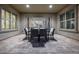 Charming outdoor patio with stylish furniture, perfect for entertaining, and a seamless transition to the home's interior at 10110 W El Cortez Pl, Peoria, AZ 85383