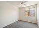 Bedroom with gray carpet, bright white walls, and lots of natural light at 10588 E Tierra Buena Ln, Scottsdale, AZ 85255