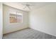 Bedroom with gray carpet, bright white walls, and lots of natural light at 10588 E Tierra Buena Ln, Scottsdale, AZ 85255