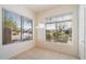 Eat in kitchen nook featuring desert landscaping views and a hanging light fixture at 10588 E Tierra Buena Ln, Scottsdale, AZ 85255