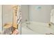 Bright bathroom with a garden tub and a separate glass shower at 14000 N 94Th St # 3190, Scottsdale, AZ 85260