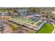 Aerial view of covered bocce ball courts near a pool and clubhouse for outdoor recreation at 15145 W Catalina Dr, Goodyear, AZ 85395