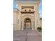 The grand entrance to Westwind Tavern with stone pillars and wrought iron details at 15145 W Catalina Dr, Goodyear, AZ 85395