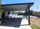 Spacious covered patio with an outdoor grill and a view of the pool at 1531 W Naranja Ave, Mesa, AZ 85202