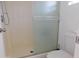 This walk in shower features frosted glass doors at 1531 W Naranja Ave, Mesa, AZ 85202