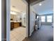 Bathroom featuring double vanity, framed mirror, walk-in shower and neutral tile floor at 17531 W Hedgehog Pl, Surprise, AZ 85387