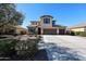 Charming home with neutral stucco, desert landscaping, and a spacious 3-car garage at 17531 W Hedgehog Pl, Surprise, AZ 85387