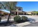 Inviting two-story home boasting a 3-car garage, desert landscaping, and a well maintained yard at 17531 W Hedgehog Pl, Surprise, AZ 85387