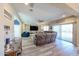 Inviting living room showcases stylish floors, and easy access to outdoor living space at 17531 W Hedgehog Pl, Surprise, AZ 85387