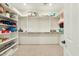 A large walk-in closet with ample shelving and storage space is ready to be filled at 17727 N 95Th Pl, Scottsdale, AZ 85255