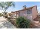 A view of the house featuring a covered patio and an air conditioning unit on the roof at 1871 E Westchester Dr, Chandler, AZ 85249